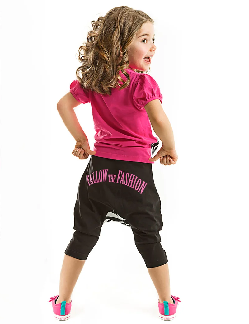 دينوكيدس طقم بنطلون واسع مخطط باللونين الأبيض والأسود من  قطع